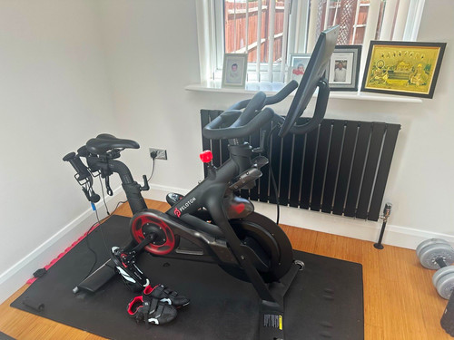 Peloton bike with mat and - bike,